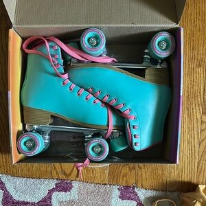 Teal Roller Skates with Pink Accents